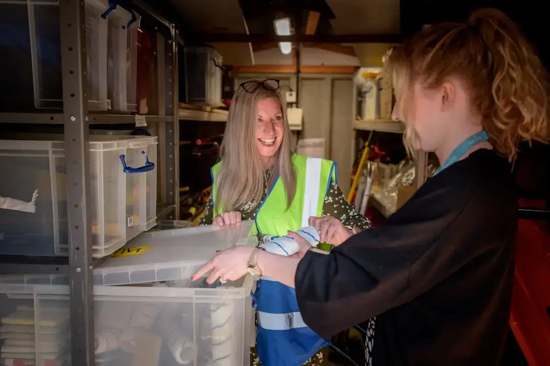 Close-up of hands sorting recyclable materials for environmental protection