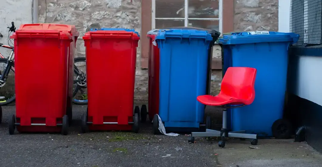 A designated collection point for recycling old electronics and electronic waste in a clean facility.