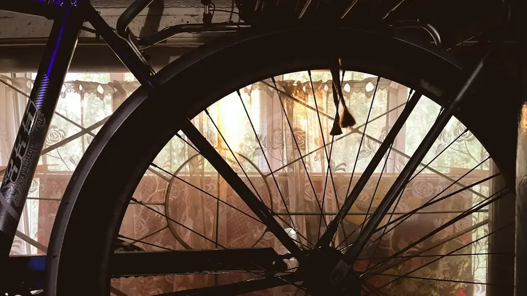 A clean and organized modern bicycle service shop with specialized tools and bikes on repair stands.