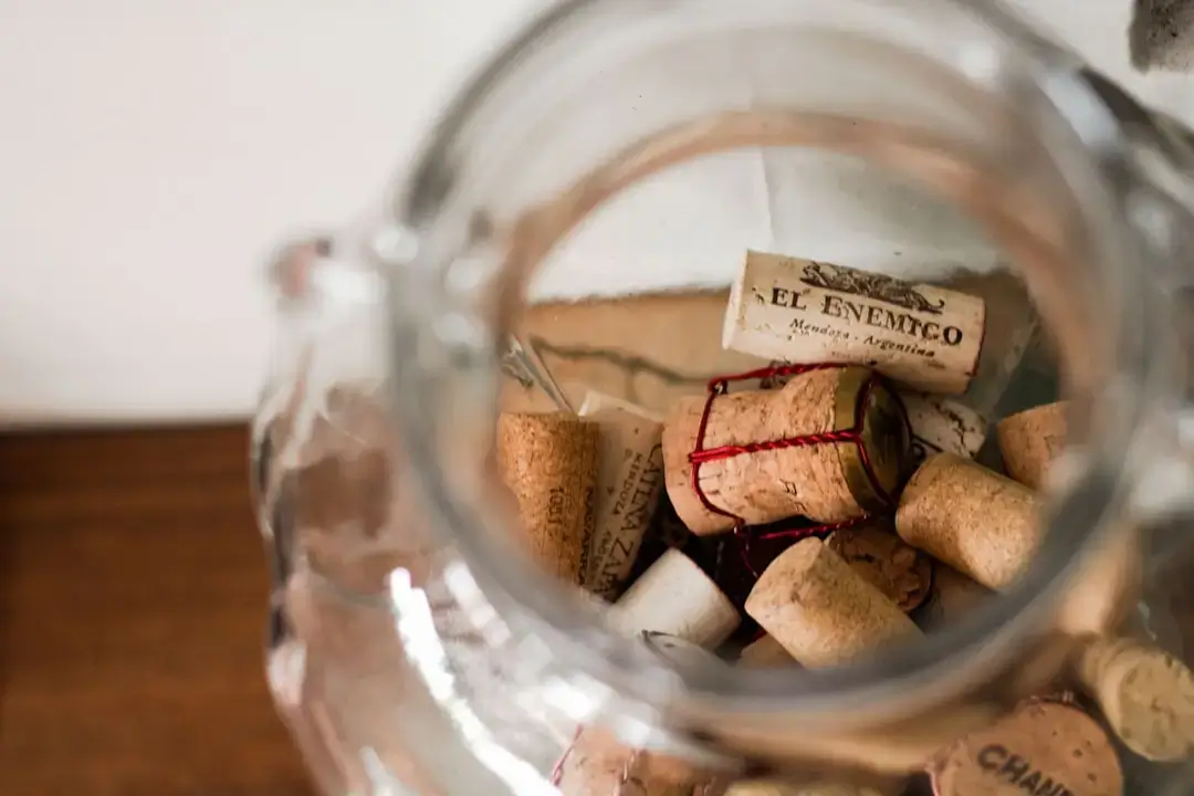 Neatly arranged clear glass jars and sorting bins used for ethical home organization and storage.