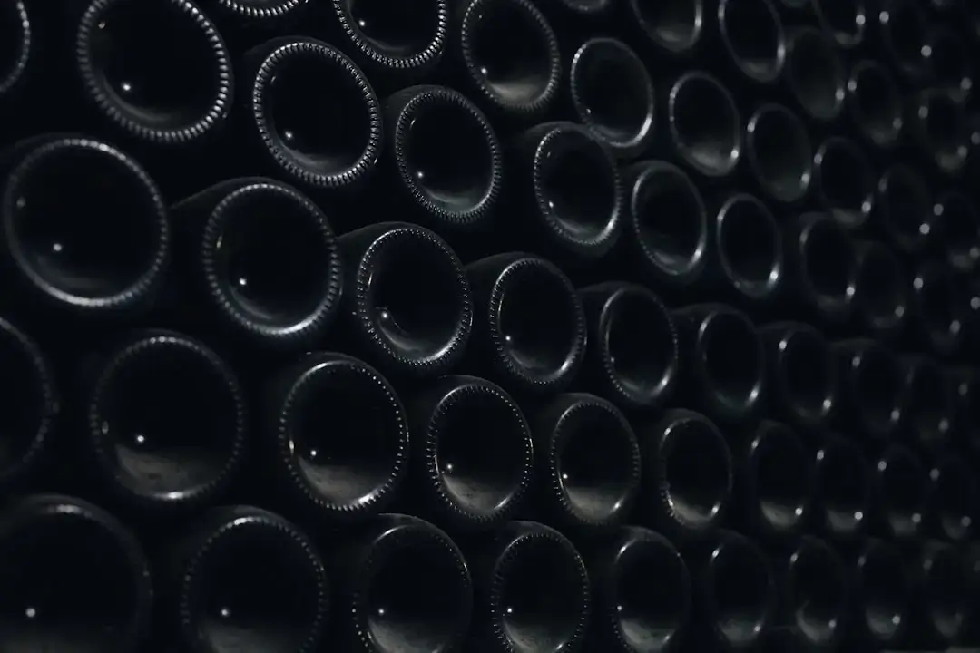 A collection of clear plastic bottles gathered for recycling to protect the environment