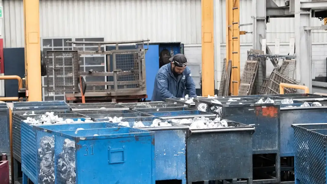 Close-up of organized metal spare parts and components from recycled domestic appliances ready for processing.
