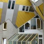 yellow and white house with glass windows