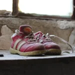 white and red nike sneakers