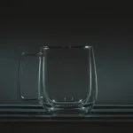 clear glass mug with water