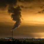 smoke coming out of factory