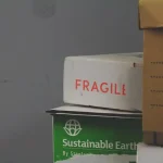 white and red Fragile labeled box