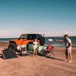 a man throwing a frisbee at a woman