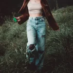 a person walking through a field