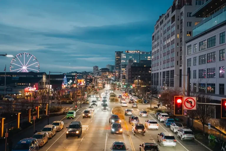 Busy city street with traffic at dusk