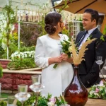 a man and a woman standing next to each other