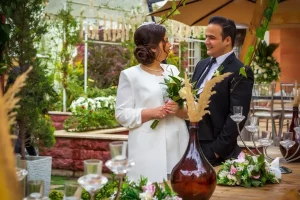 a man and a woman standing next to each other