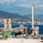 A modern waste-to-energy incineration plant with clean emissions representing eco-friendly waste management solutions.